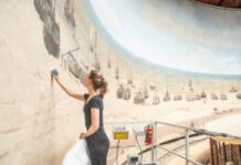 Schoonmaak en restauratie van het grootste schilderij van Nederland